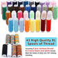 Assorted high-quality thread spools in many colors arranged for a sewing kit