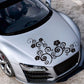 Black floral totem car hood sticker with swirled vine and flower details.