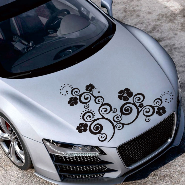 Black floral totem car hood sticker with swirled vine and flower details.