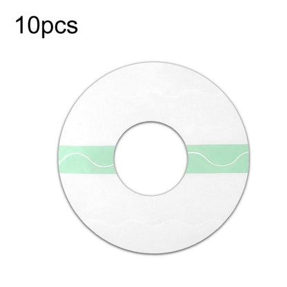 Round TPU adhesive sensor patch with transparent backing and small center sensor spot