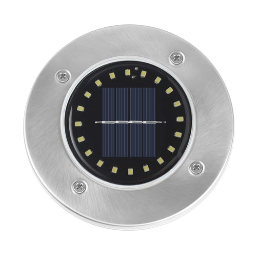 Round stainless solar LED garden light with solar panel and small ring of LEDs