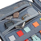 Apple Watch storage bag interior with clear pockets and colorful band holders