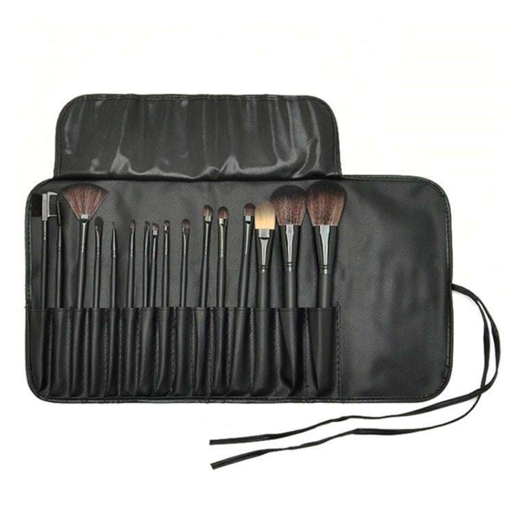 Makeup brush set in a black roll-up case, showing multiple brushes with soft bristles