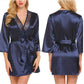 Blue satin nightgown with lace V neckline, tie belt, three-quarter sleeves (front)