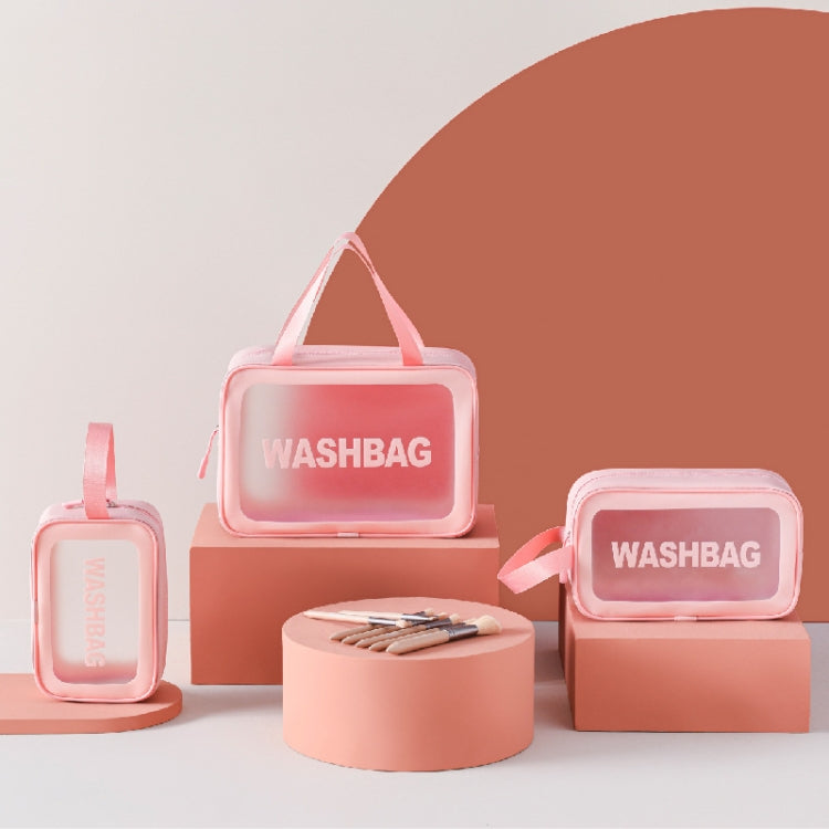 Pink transparent PVC cosmetic bag set with clear front, zippers, and carry handles