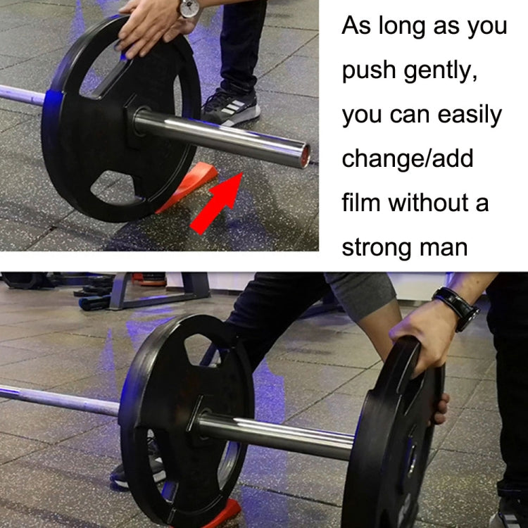 Red barbell protective gasket installed on barbell plate for safer changes