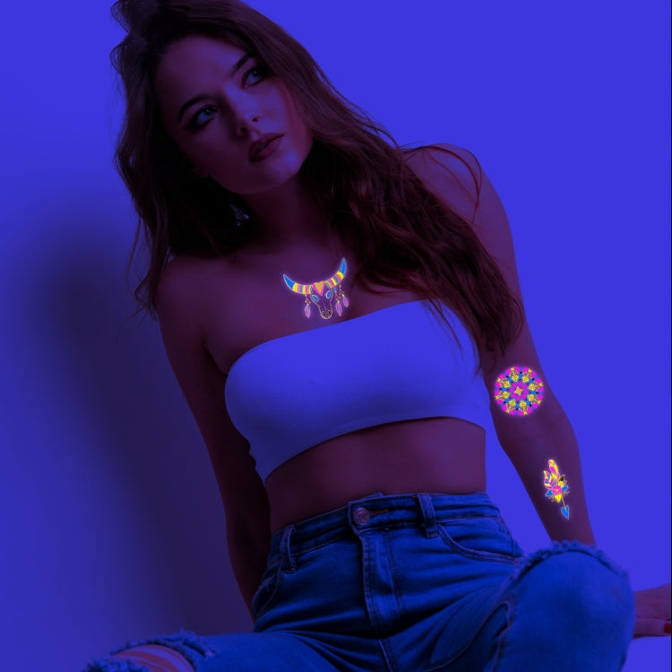 Fluorescent tattoo stickers on skin: neon bull-head necklace and bracelet-style arm design
