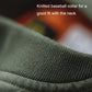 Green ribbed baseball collar of bomber jacket
