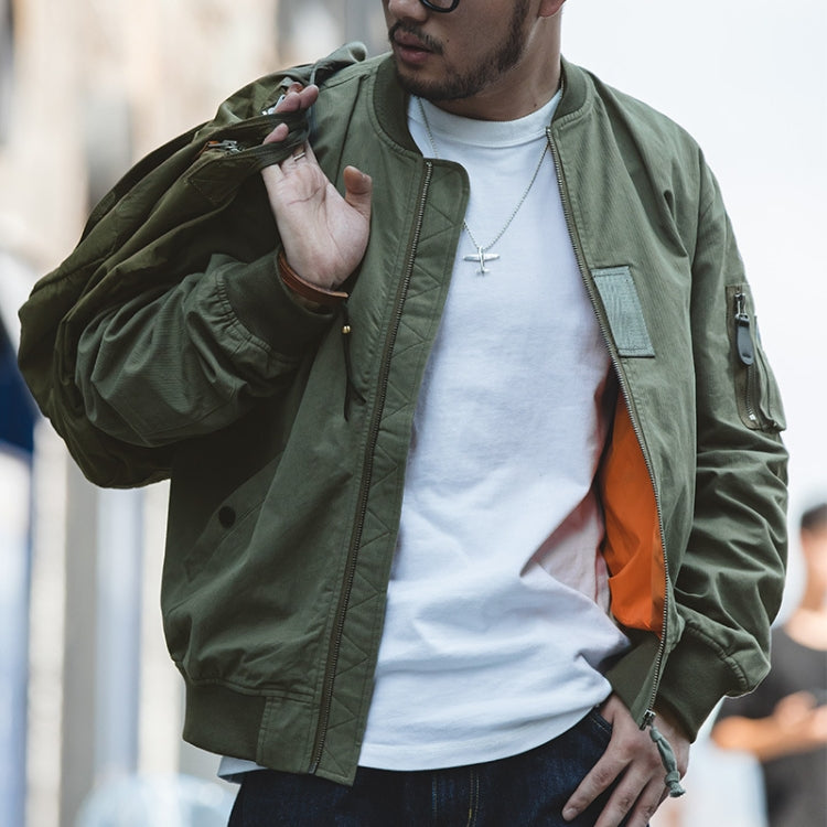 Green bomber jacket, zip front and chest patch pocket; ribbed cuffs and orange inner lining