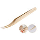 Gold eyelash tweezers with curved tip and etched decorative handle pattern