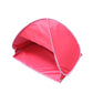 Pink pop-up sunshade tent with open arched entrance and center support pole