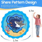 Children sprinkler play mat with shark design, size marks, and child standing