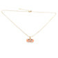 Gold-tone chain necklace with a single orange jack-o’-lantern pumpkin pendant