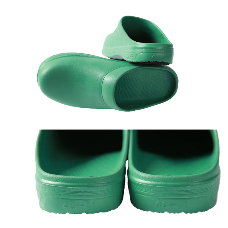 Green slip-on work clog rear view with molded heel and textured sole