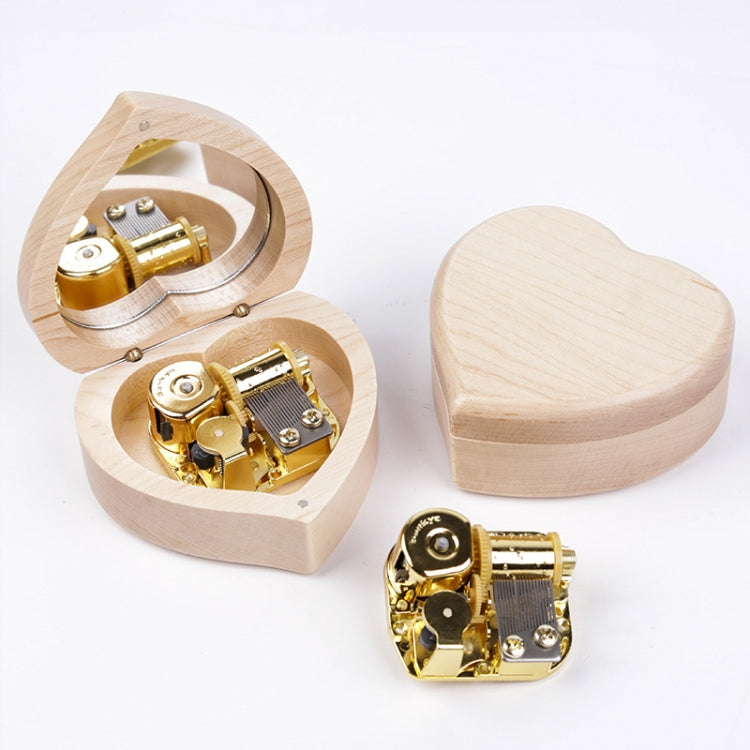 Heart-shaped wooden music box with mirror lid, gold-tone mechanism, open and closed views