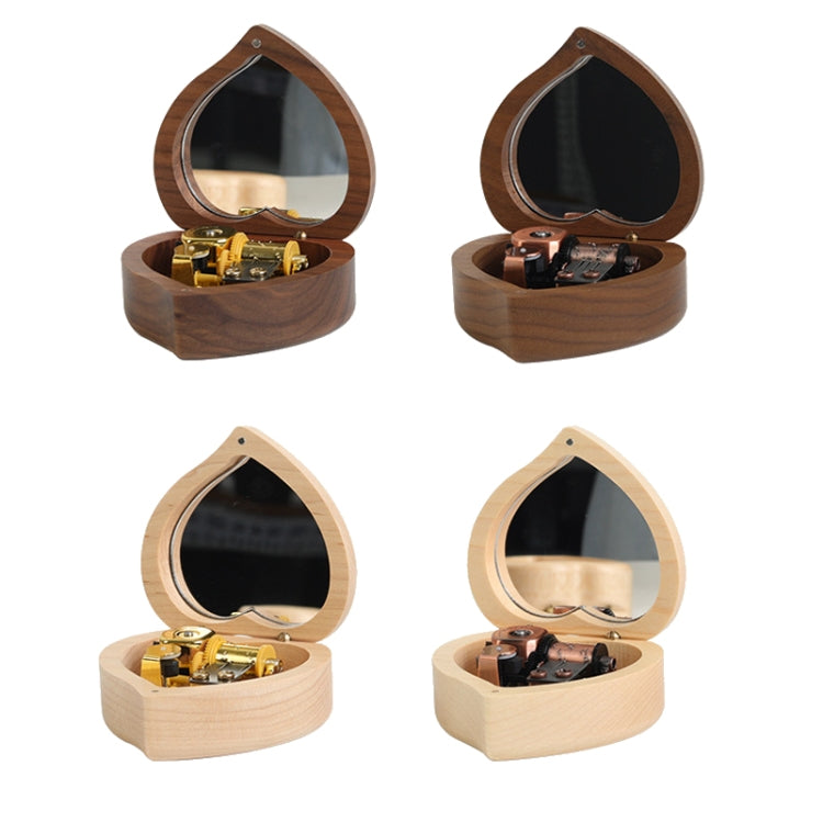 Heart-shaped wooden music box set with mirrored lids in light and dark wood finishes