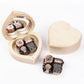 Light heart-shaped wooden music box with mirror lid and copper-tone music mechanism, open