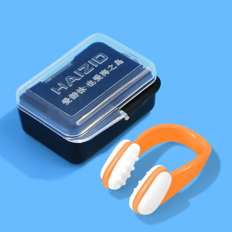 Silicone nose clip with orange frame and white soft inner pads