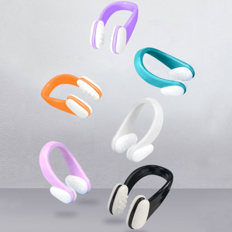 Assorted silicone nose clips with different colored frames and white pads