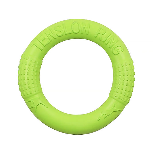 Green rubber dog tension ring toy with textured grip bumps and embossed grip letters