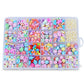 Kids DIY beaded jewelry kit with mixed beads, beads pearls, and charms in a tray