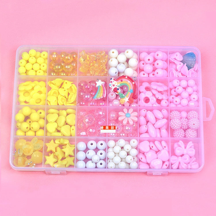 Kids DIY beaded jewelry kit with pink-themed acrylic beads and rainbow charms in tray