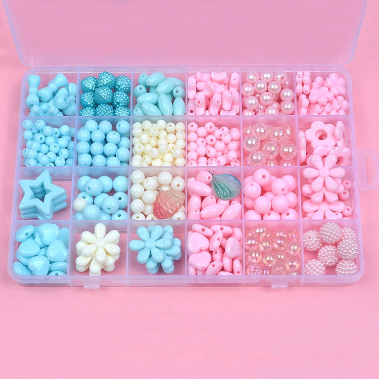 Kids acrylic bead jewelry kit case with pastel beads, star and flower charms in sections