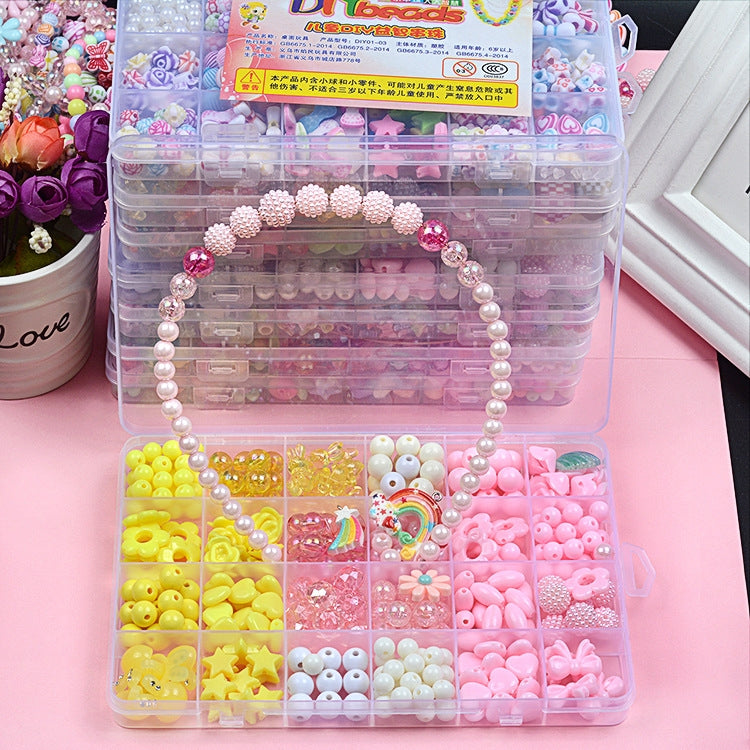Clear acrylic bead kit storage case with mixed beads and sample beaded bracelets