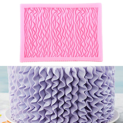 Pink silicone fondant mold with wavy pleated ruffle pattern for skirt cake decorating
