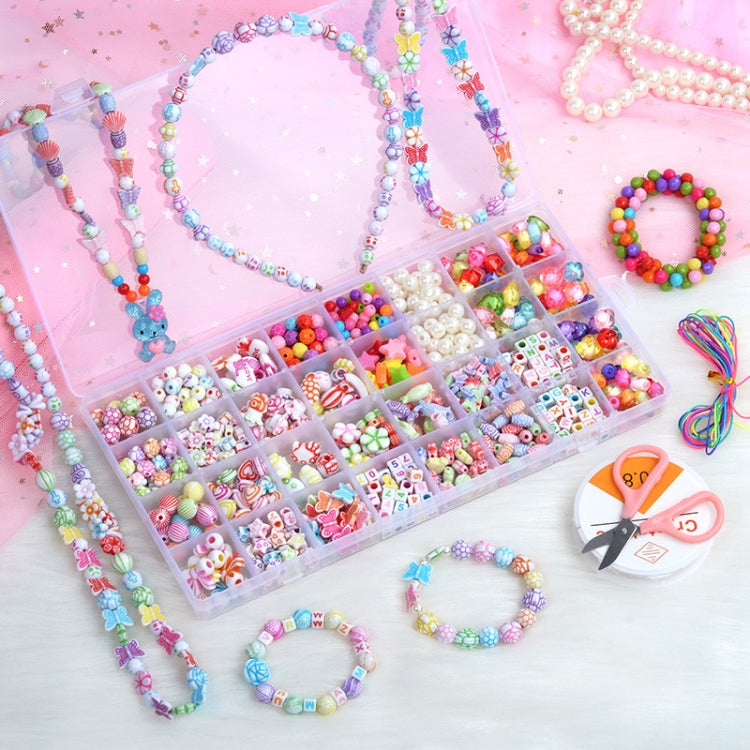 Beaded bracelets and headband with charms, plus organized bead tray