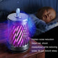 Mosquito killer night light with purple light glow and top handle on bedside table