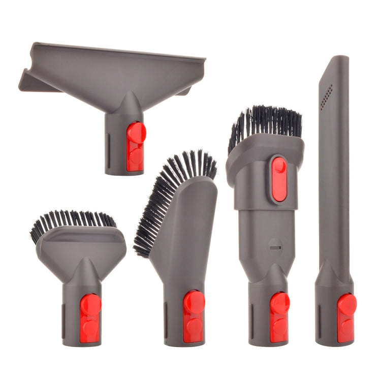 Vacuum accessory set with soft brush, crevice tool, stain brush, adapter, and nozzle.
