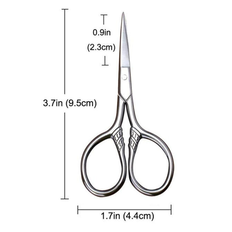 Small beard scissors with pointed blades and round finger loops, compact silver metal