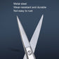 Beard scissors with pointed blades, shiny silver metal body, small grooming tool