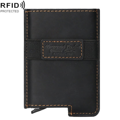 Black RFID anti-theft leather card holder with stitched edges and magnetic strap.