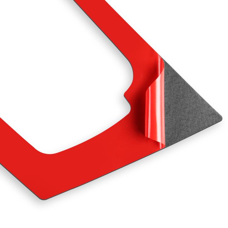 Carbon-fiber trim sticker with red protective backing and adhesive edge