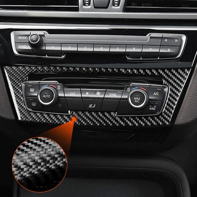 Carbon-fiber AC control panel trim sticker with circular close-up detail