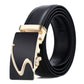 Black leather automatic buckle belt with gold-toned wavy buckle front and hanging charm