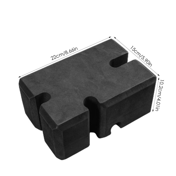 Dark foam bench press brick with molded handles and rectangular support base