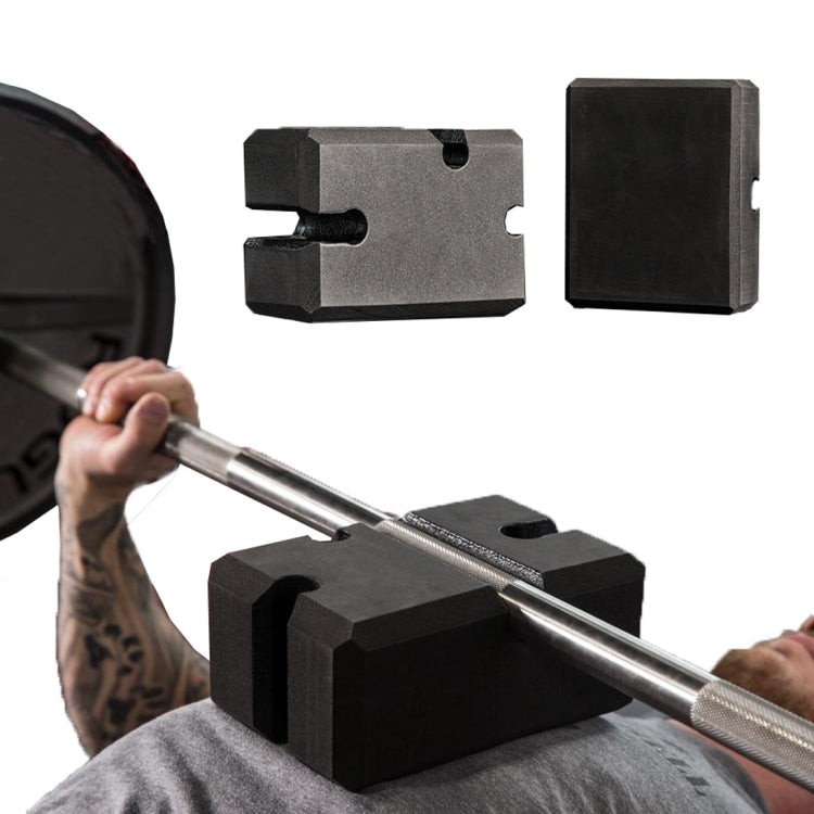 Foam bench press brick blocks supporting a barbell during use