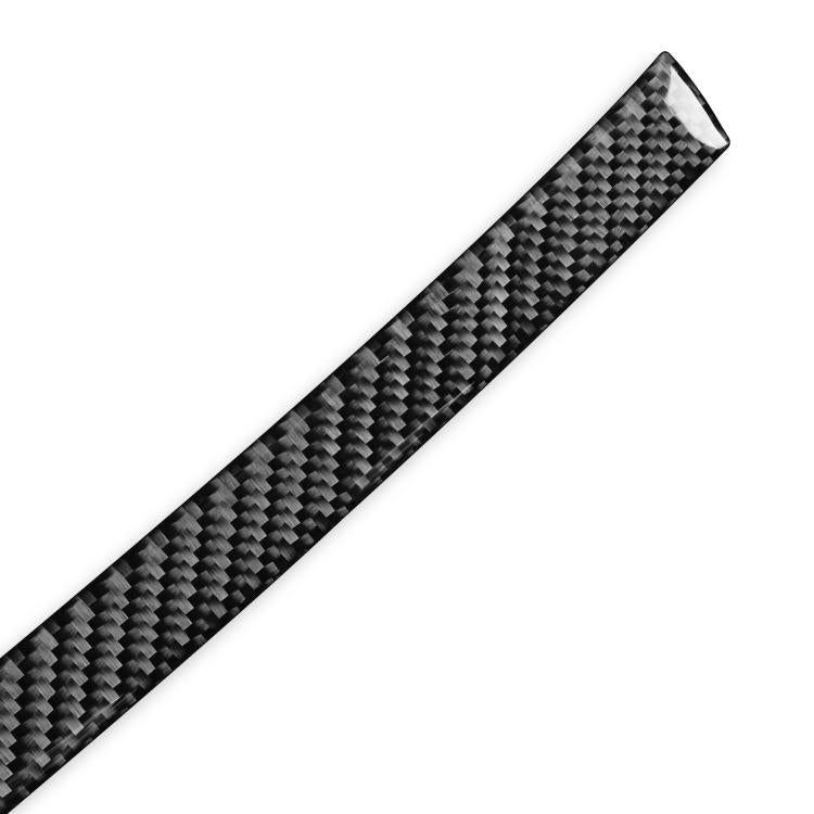 Carbon fiber weave radio panel sticker, angled close-up of black and gray pattern