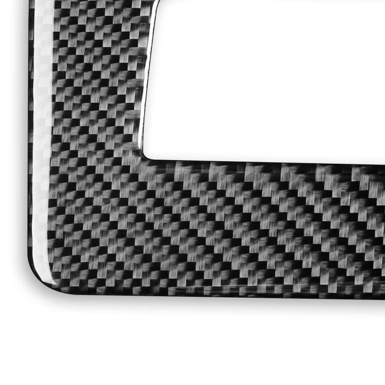 Close-up carbon fiber-look sticker corner with rounded edge and rectangular cutout