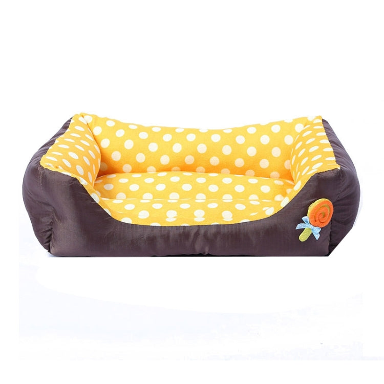 Square pet bed cushion with yellow polka dot lining and dark brown sides