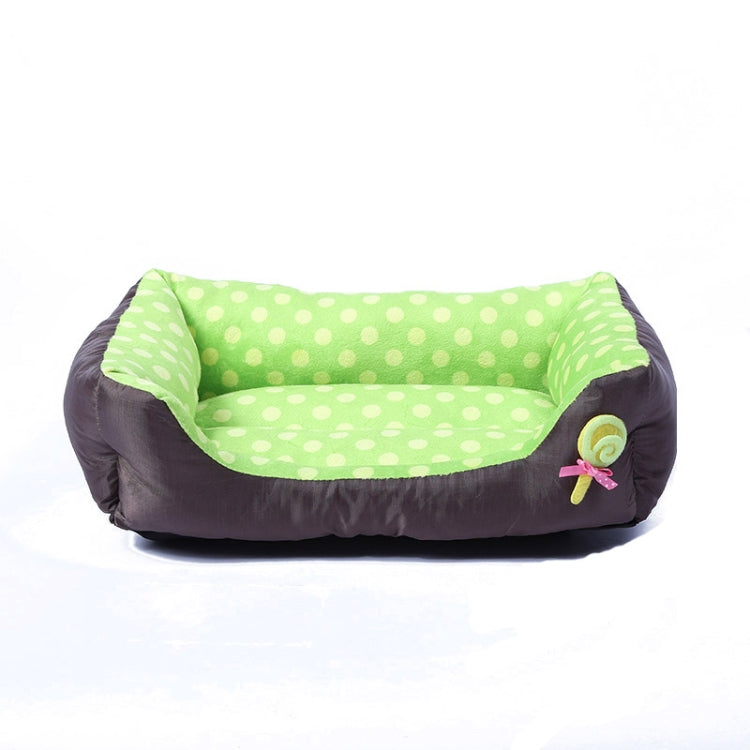 Square pet kennel cushion with green polka-dot inner, dark outer, and rose applique