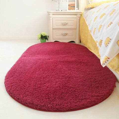 Rose red oval plush pet bed pad with soft shag pile and flat surface