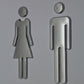 Restroom wall sign set with chrome female and male figures for bathroom doors