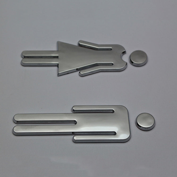 Chrome restroom sign plates with mounting discs and male/female figure shapes