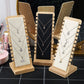 Bamboo necklace display stands set with beige, black, and white velvet panels
