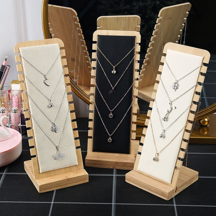 Bamboo necklace display stands set with beige, black, and white velvet panels