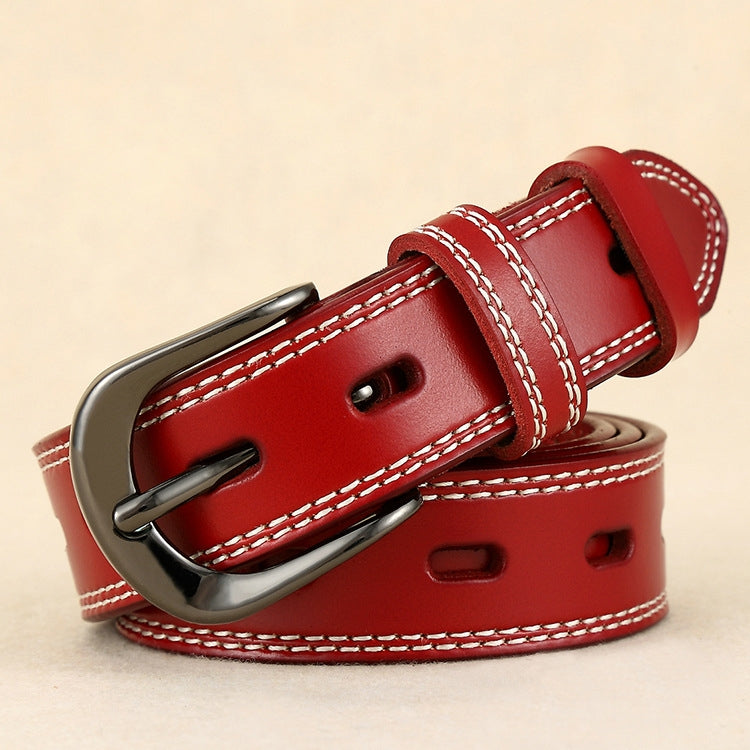 Red double-stitched belt with silver buckle, stitched keeper, and punched holes